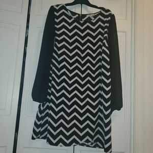 Sheer sleeved geometric print dress.